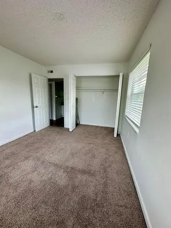 an empty room with a natural light