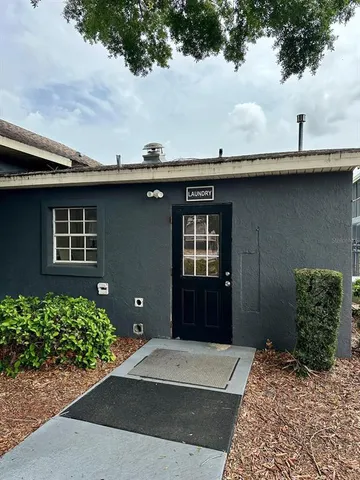 a house view with a garden space