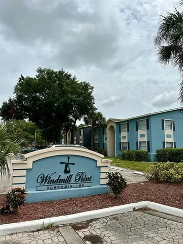 a sign that is on the side of a street