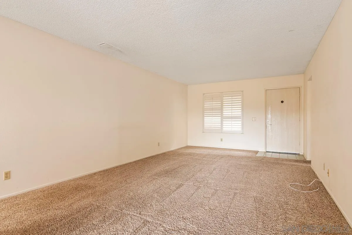 1360 Panorama Ridge Road Oceanside, CA 92056 - Photo 3 of 13 a view of an empty room with a window