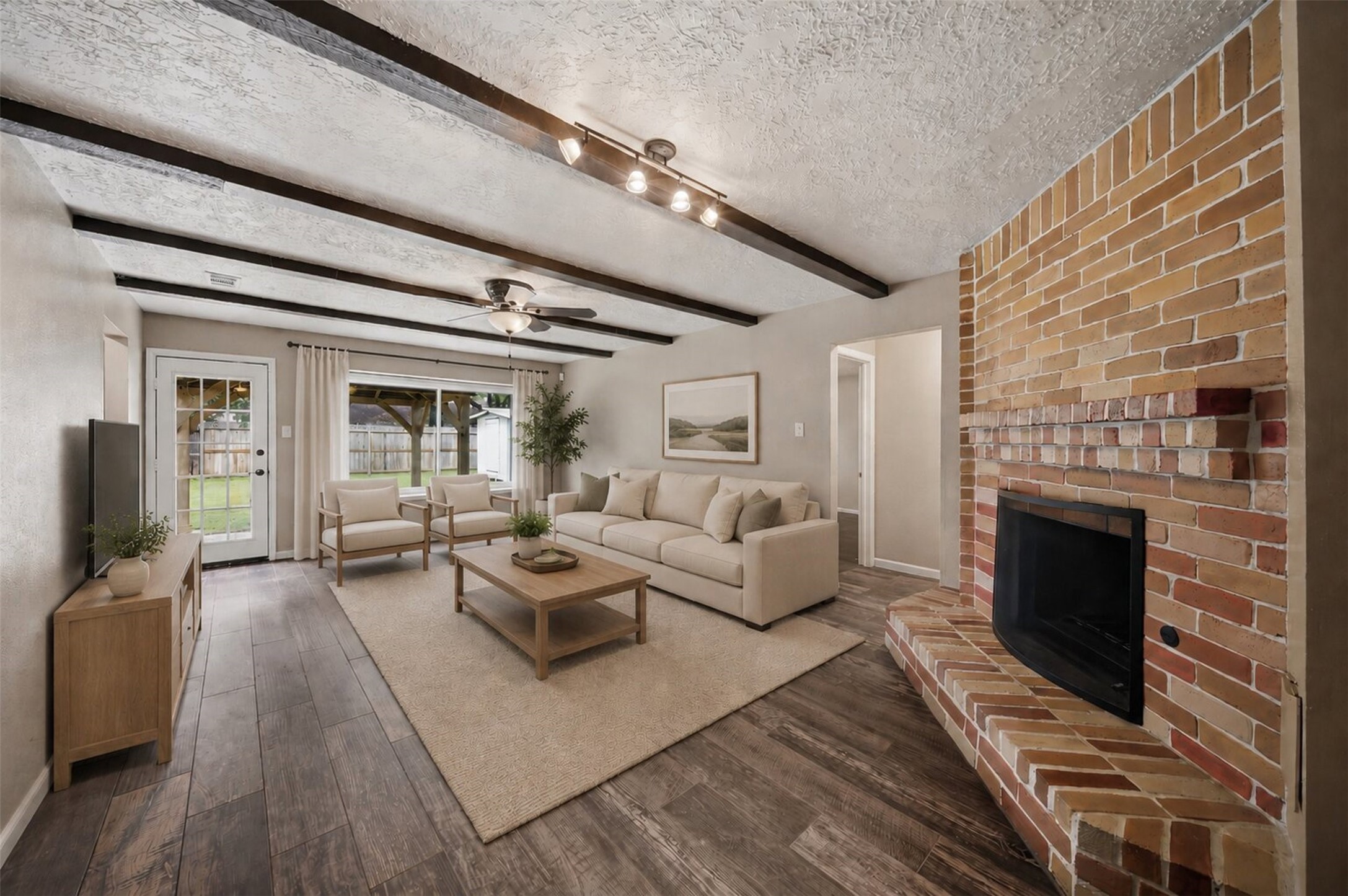 9418 Kilrenny Drive Spring, TX 77379 - Photo 1 of 47 a living room with furniture and a fireplace