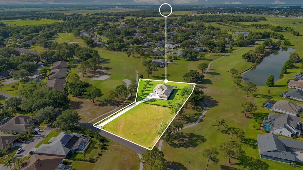 440 Palma Ceia Road Winter Haven, FL 33884 - Photo 62 of 78 an aerial view of a residential houses with outdoor space