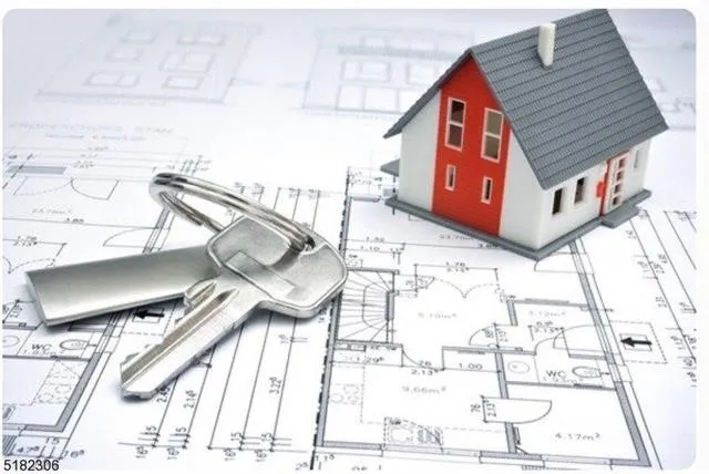 a street view with couple of cars parked in front of house
