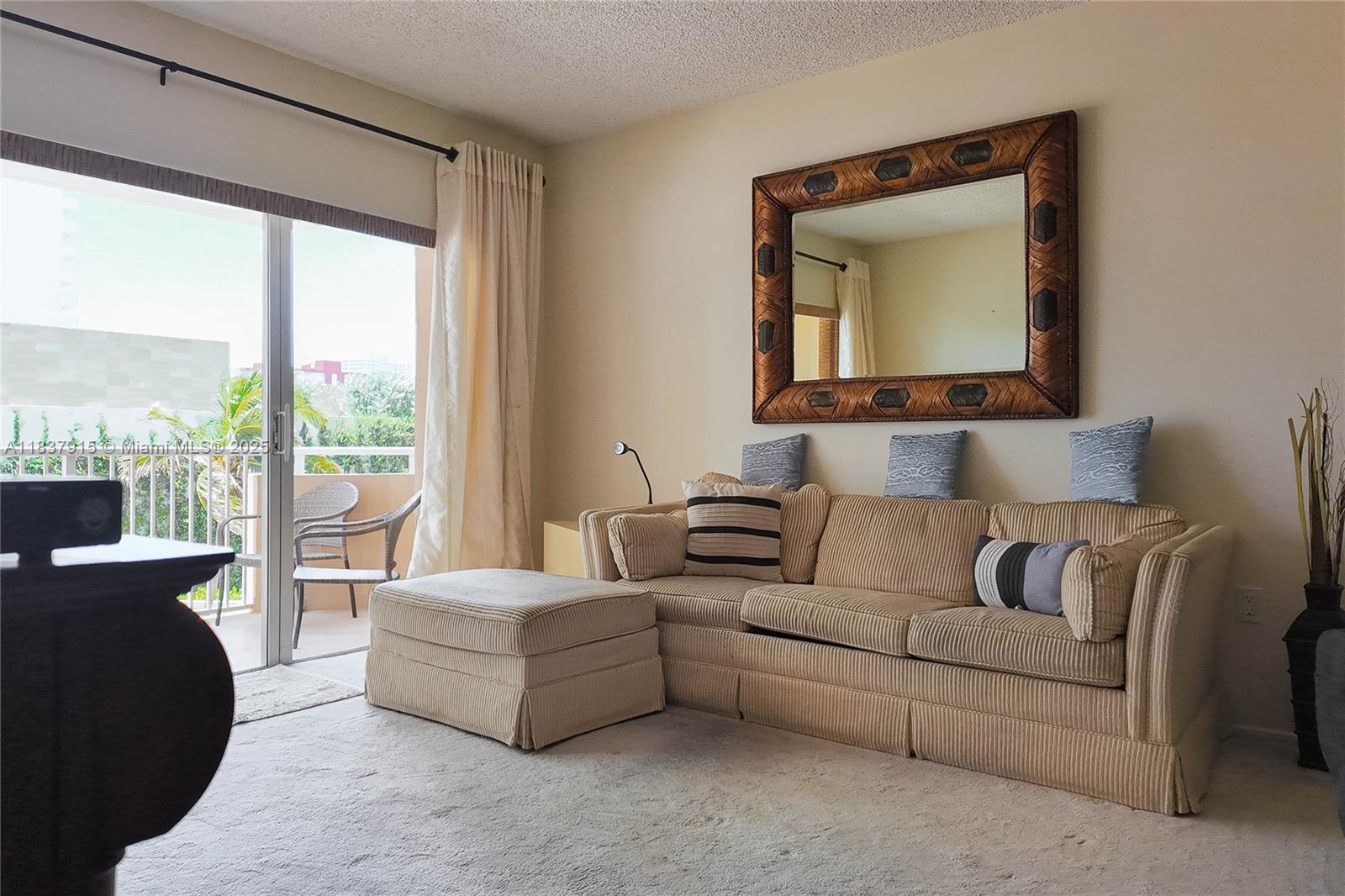 1980 South Ocean Drive, Unit 3A Hallandale Beach, FL 33009 - Photo 8 of 21 a living room with furniture and a large window