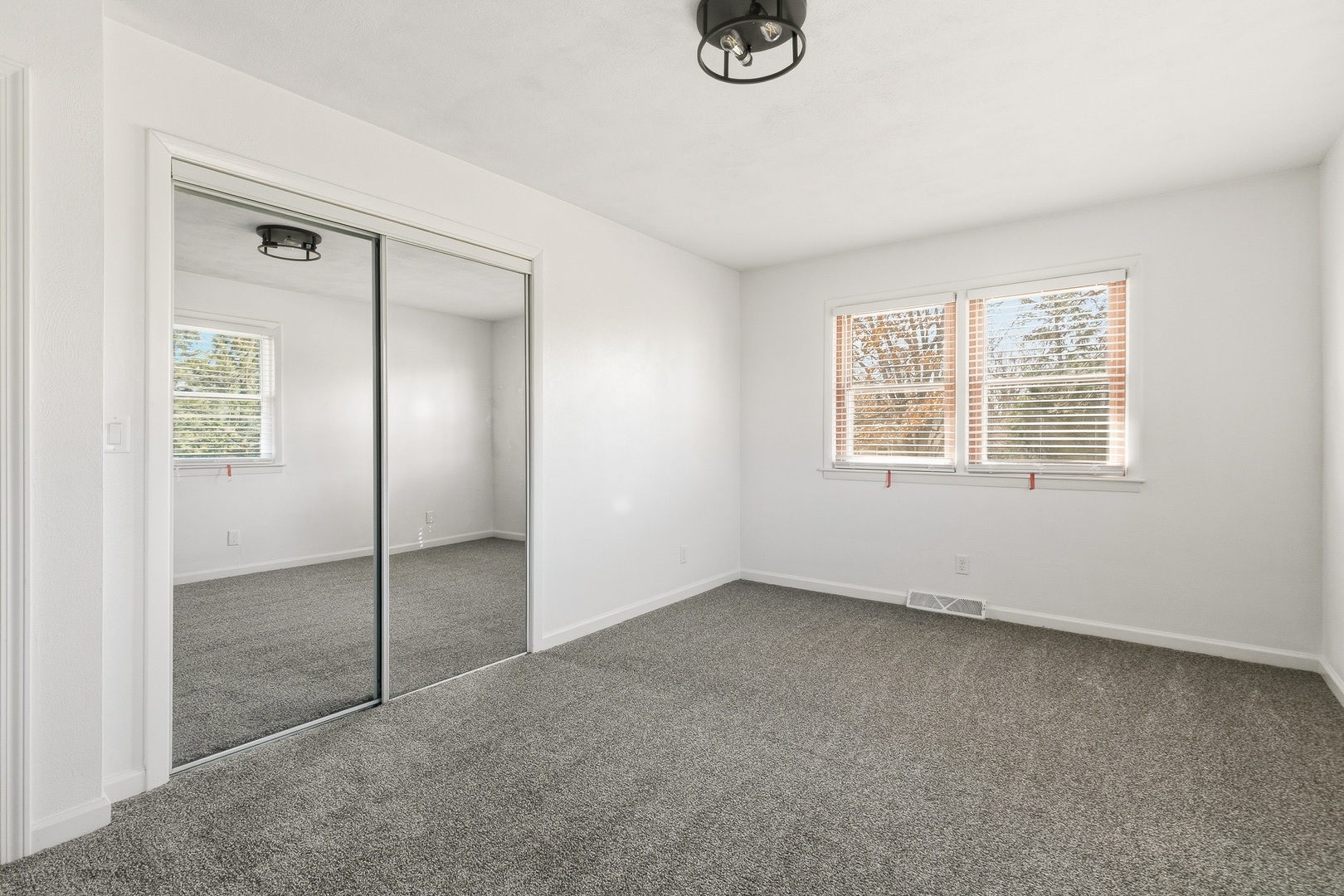 11622 27th Street West Milan, IL 61264 - Photo 22 of 49 a view of an empty room with a window