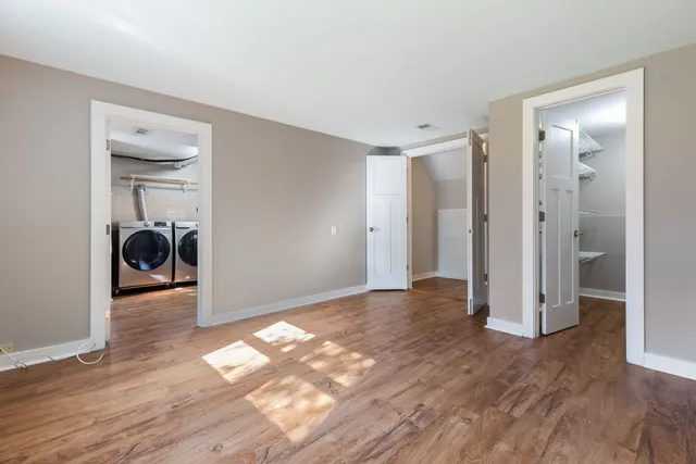a view of livingroom with wooden floor