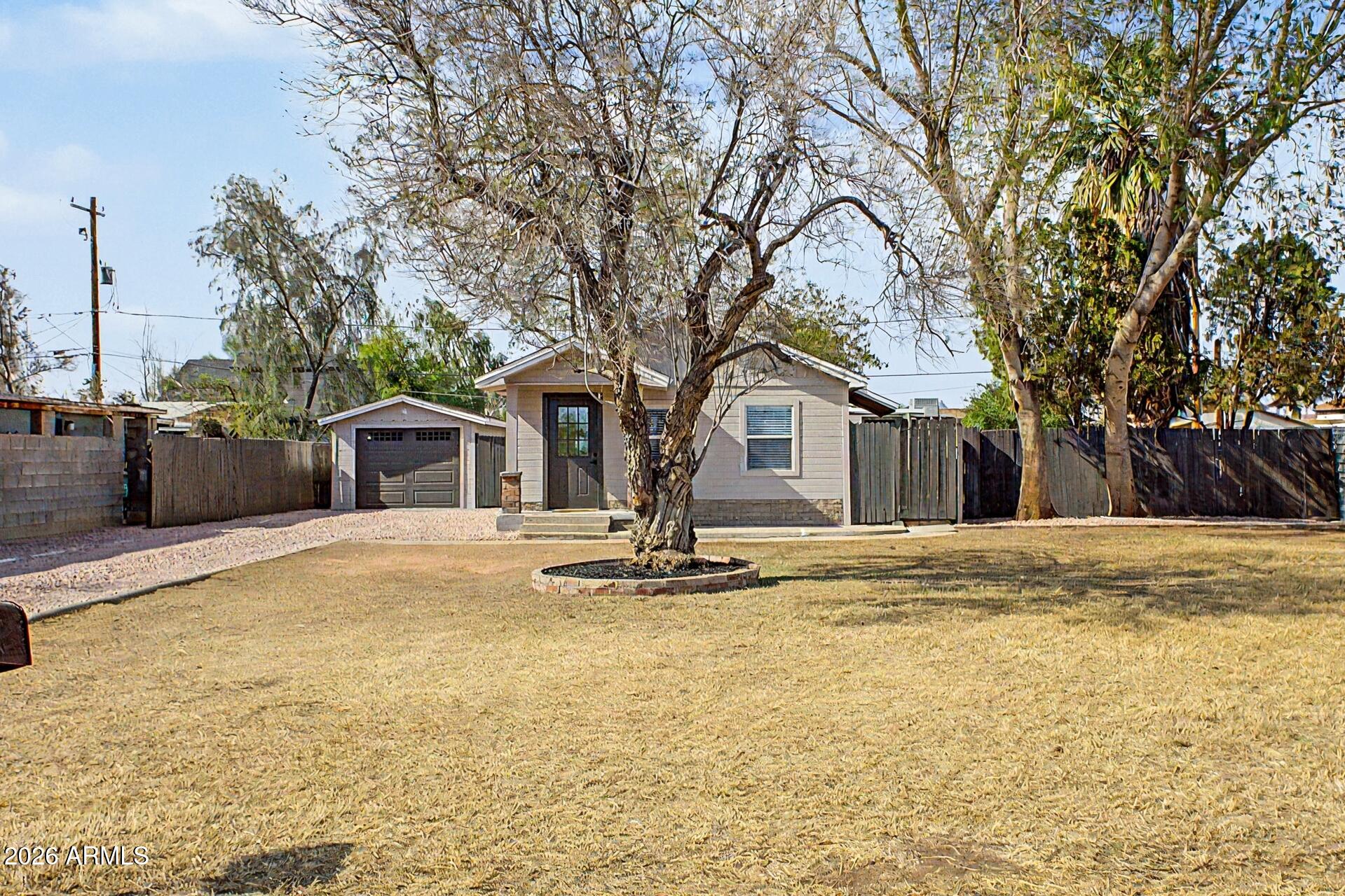 1914 East Monte Vista Road Phoenix, AZ 85006 - Photo 1 of 26 a swimming pool with outdoor seating and yard