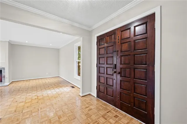 a view of an empty room with empty shelves