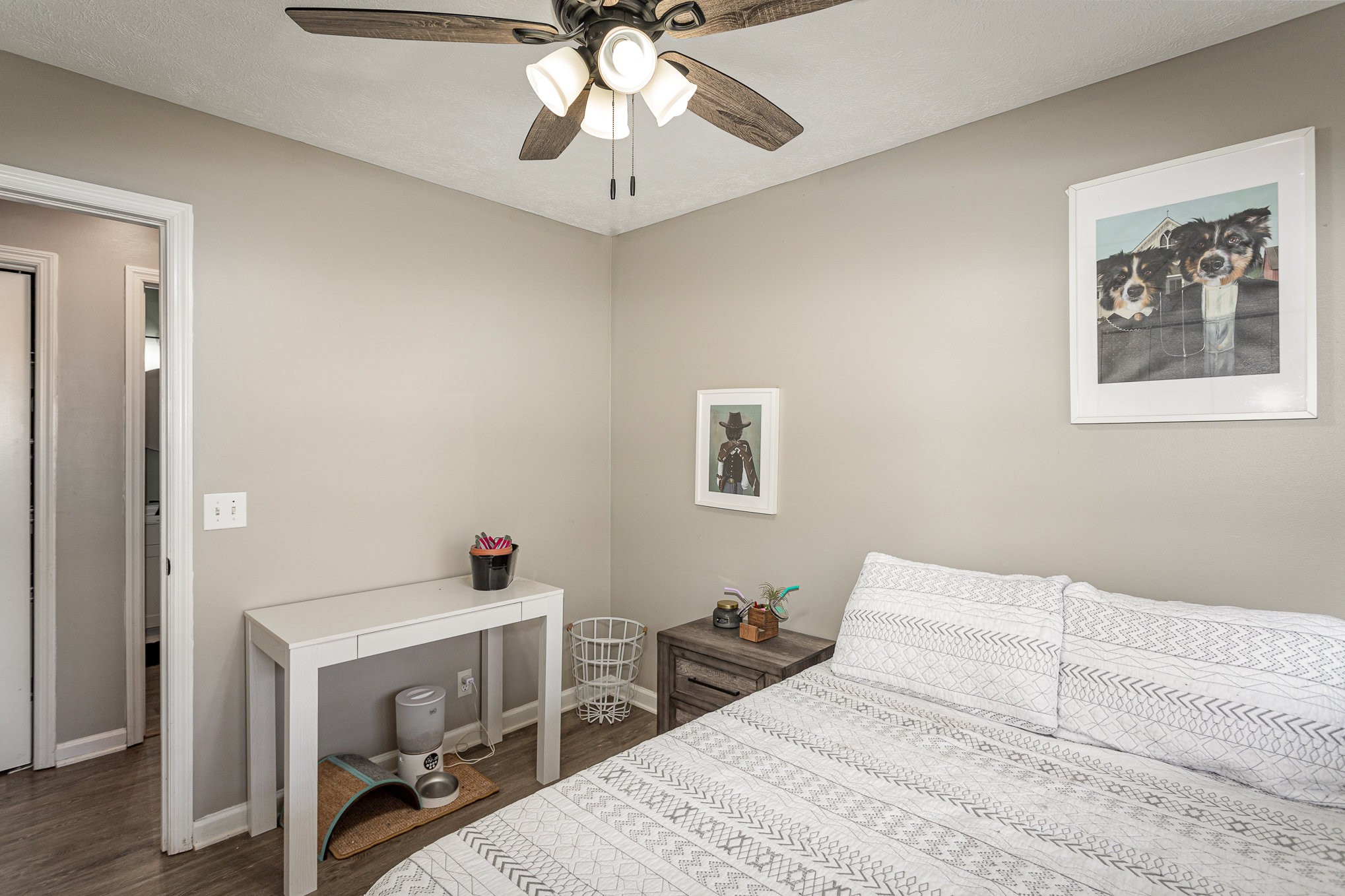 538 Old Highway 70 White Bluff, TN 37187 - Photo 23 of 29 a bedroom with a bed and a chandelier