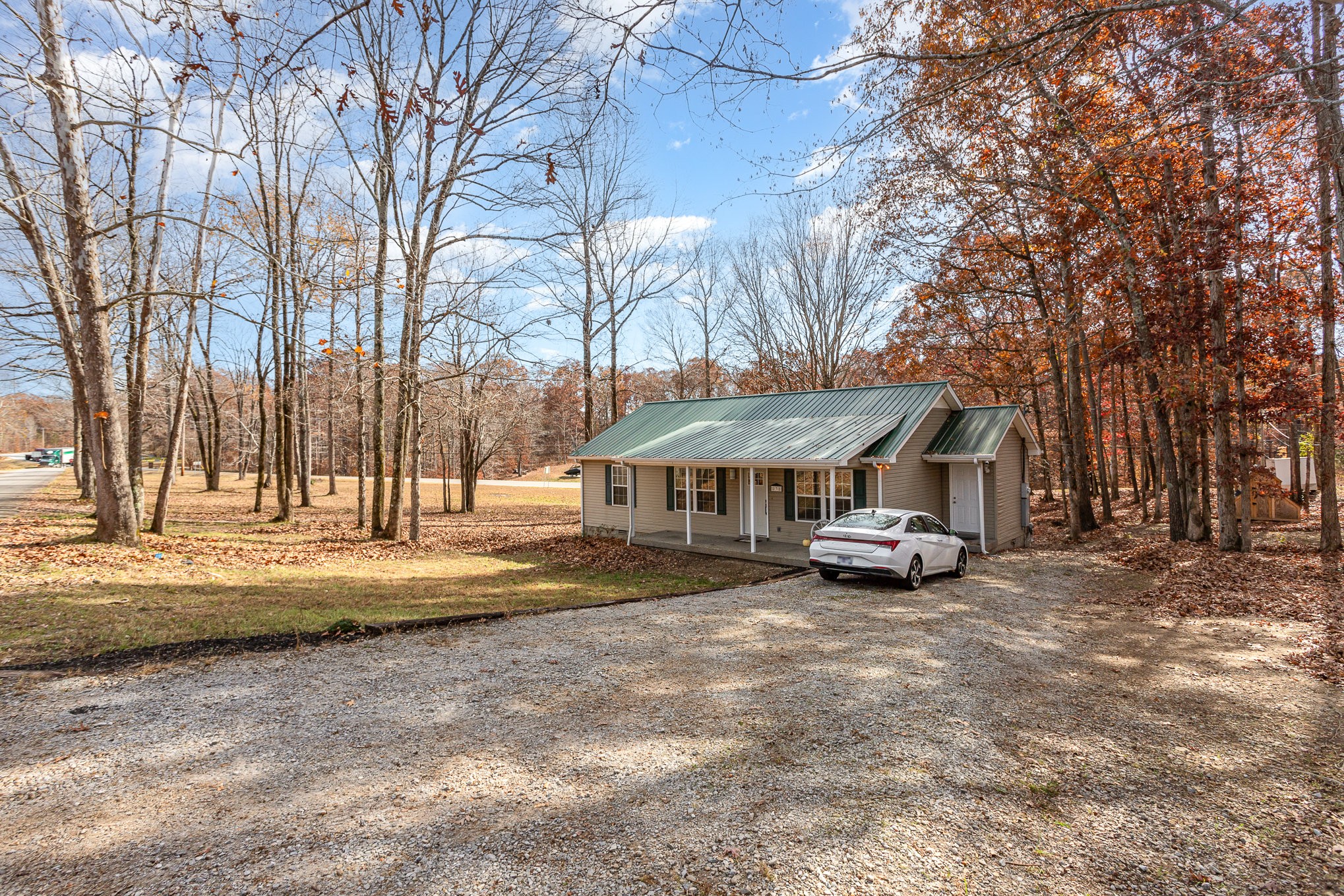 538 Old Highway 70 White Bluff, TN 37187 - Photo 4 of 29 a view of a house with a yard and large trees