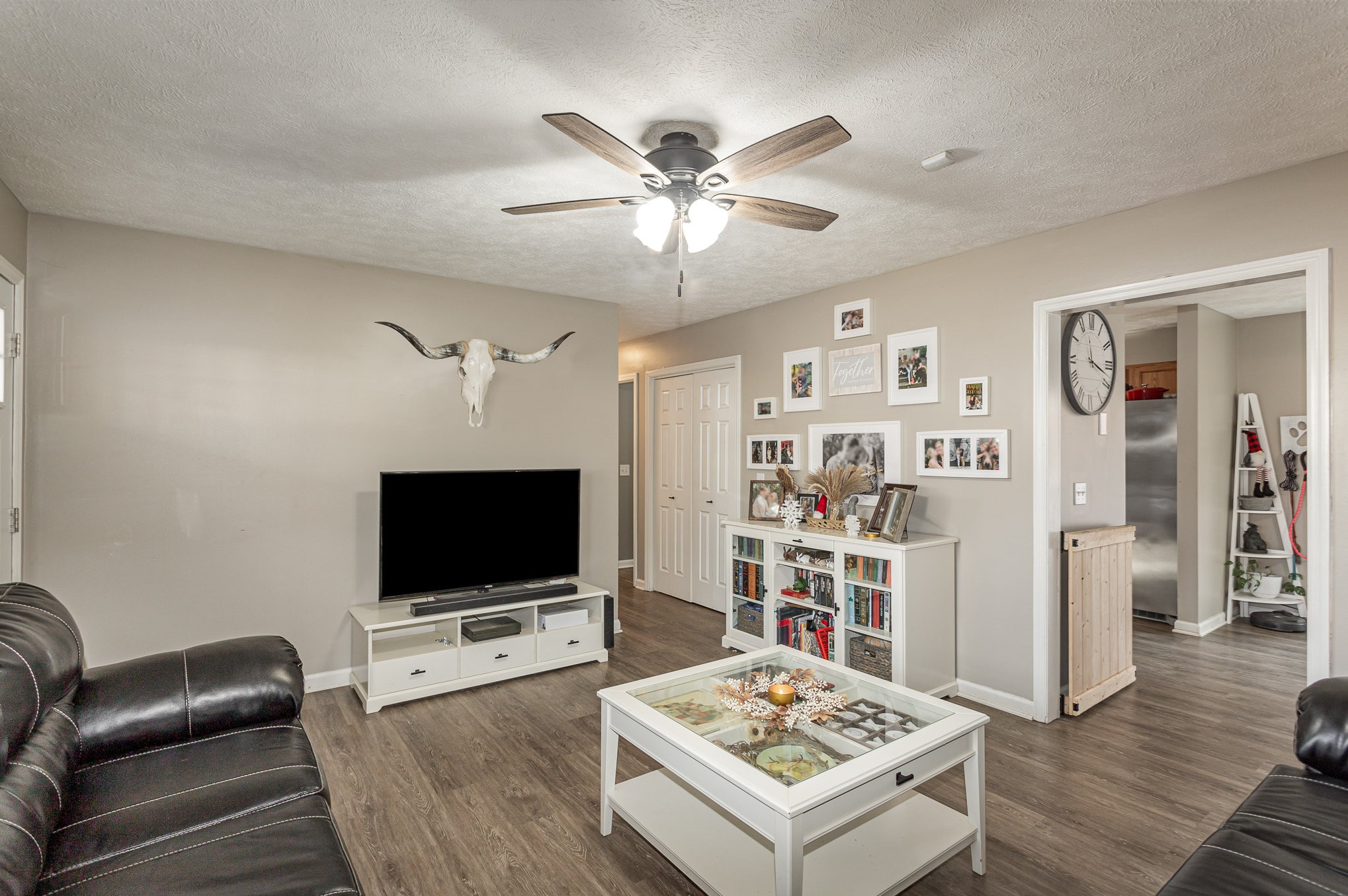 538 Old Highway 70 White Bluff, TN 37187 - Photo 6 of 29 a living room with furniture and a flat screen tv