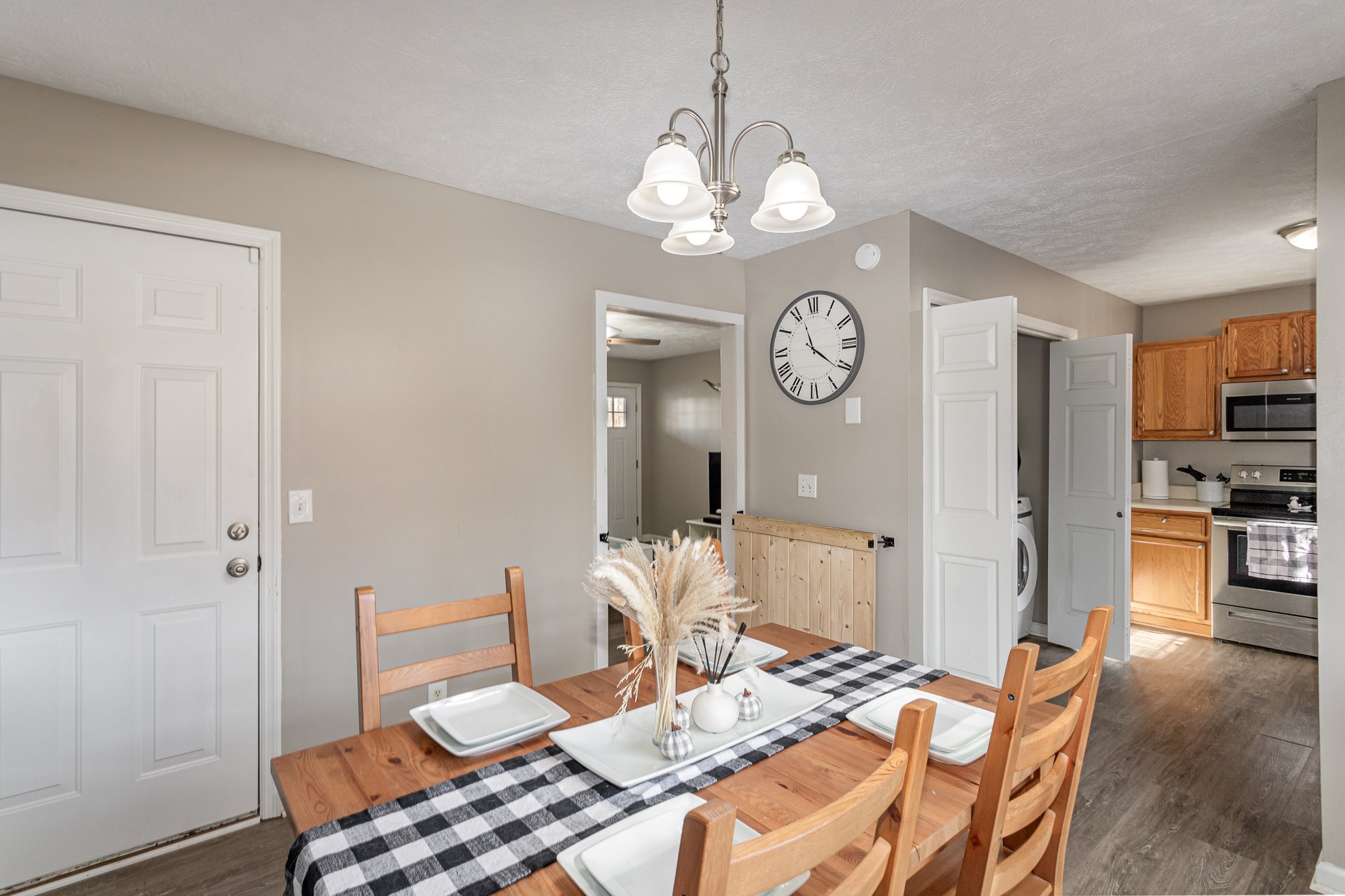 538 Old Highway 70 White Bluff, TN 37187 - Photo 10 of 29 a view of a dining room with furniture and chandelier