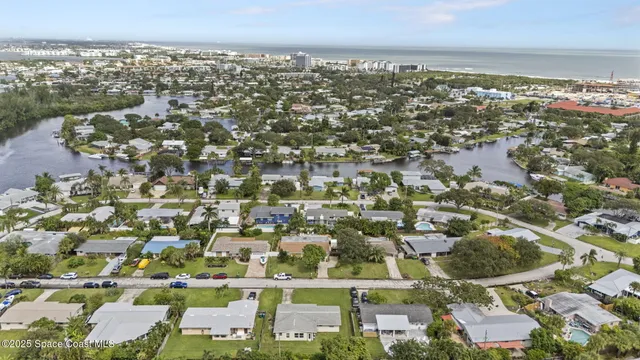 an aerial view of residential building with parking space