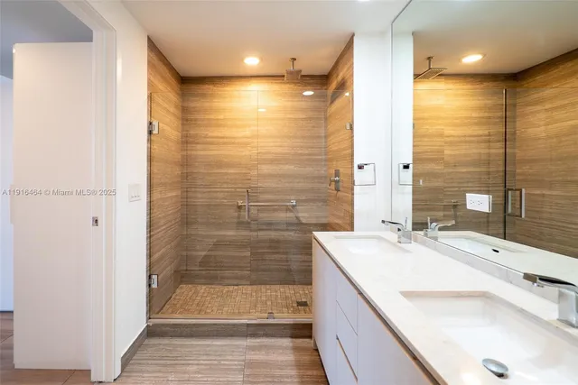 a bathroom with a sink and a shower