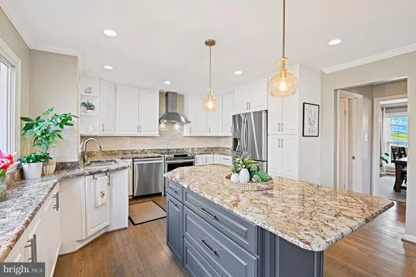 a bathroom with a double vanity sink and mirror