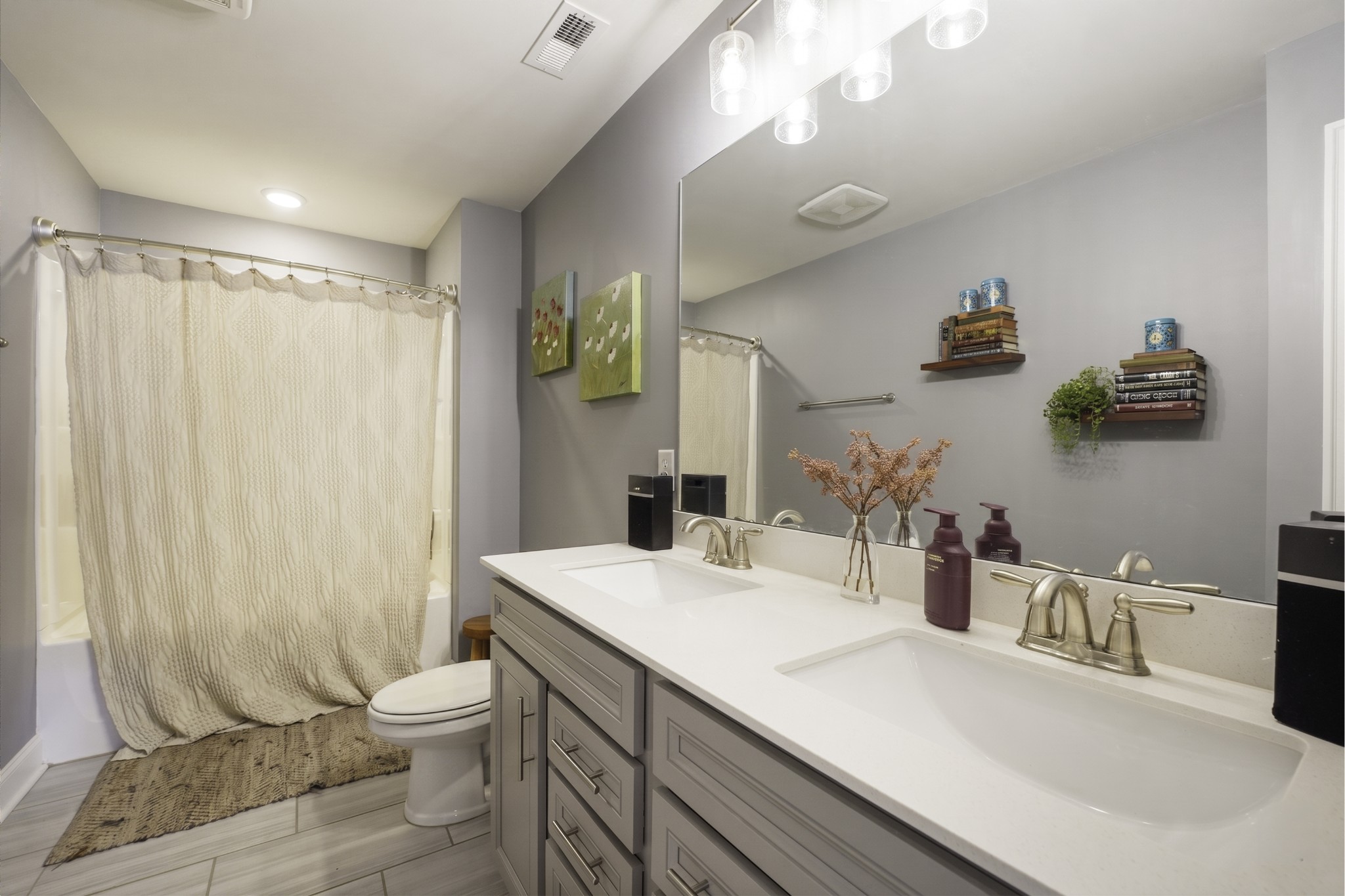 806 Chalkstone Ln Mount Mount Juliet, TN 37122 - Photo 15 of 65 a bathroom with a sink a toilet and shower curtain