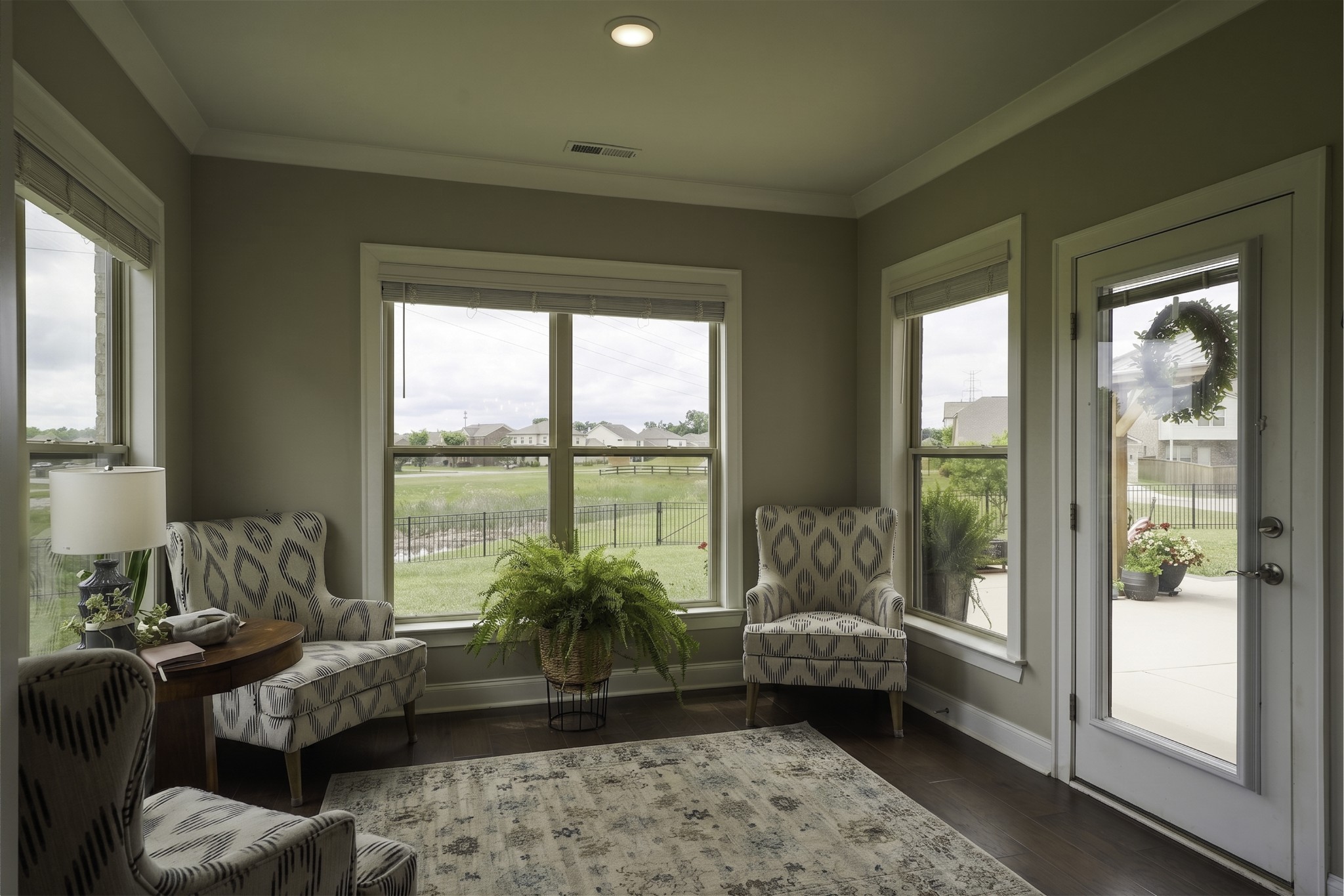 806 Chalkstone Ln Mount Mount Juliet, TN 37122 - Photo 28 of 65 a living room with furniture and a floor to ceiling window