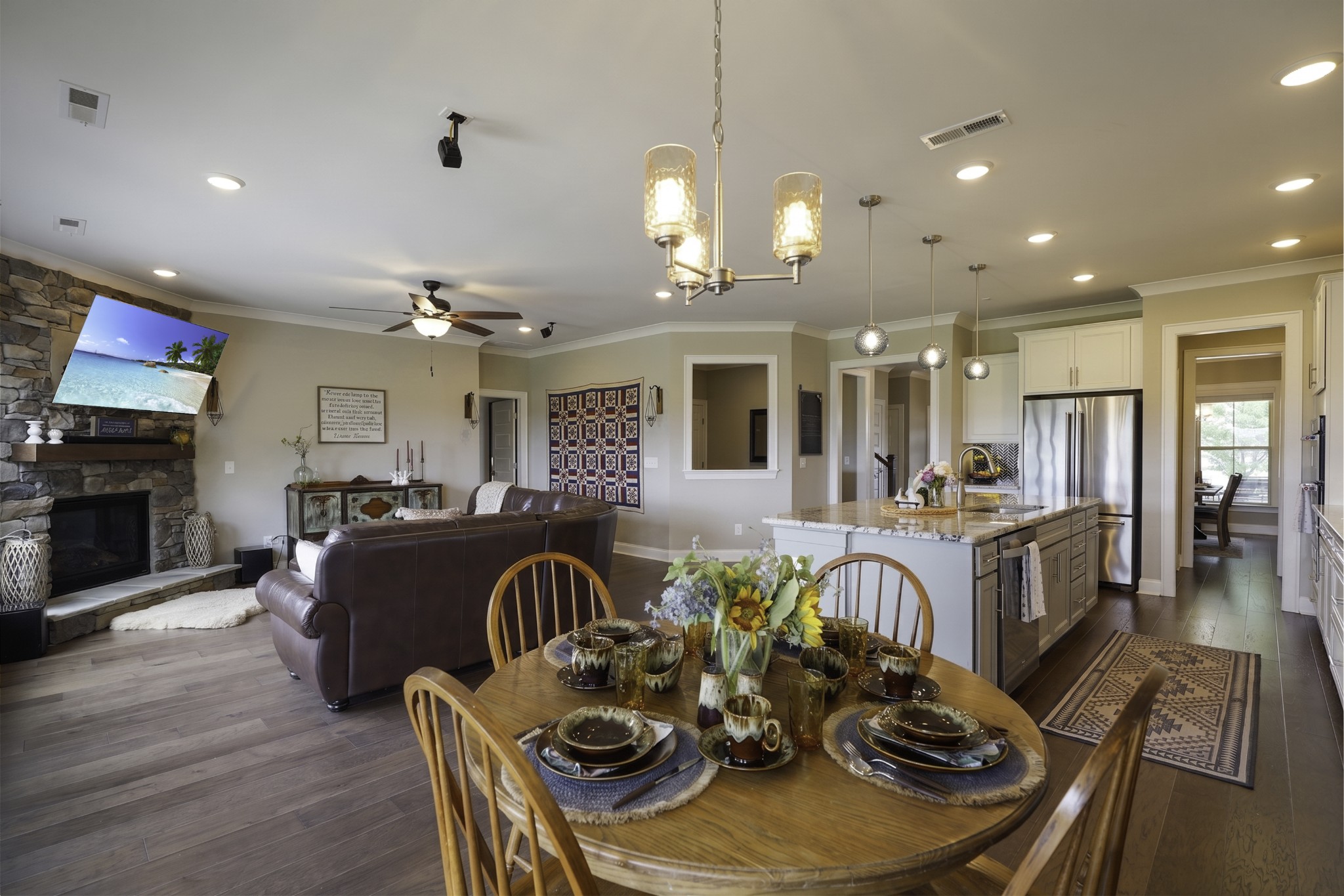 806 Chalkstone Ln Mount Mount Juliet, TN 37122 - Photo 29 of 65 a large kitchen with sink a stove and living room with wooden floor