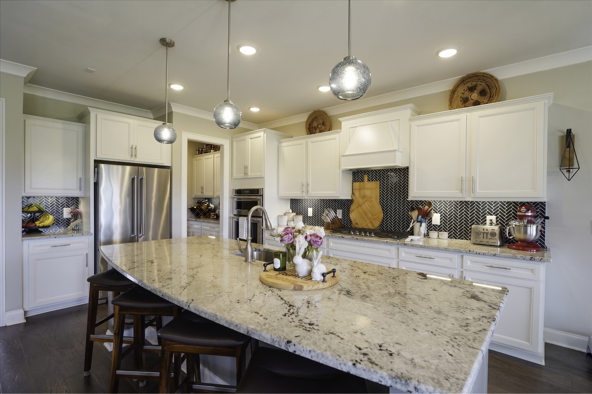 806 Chalkstone Ln Mount Mount Juliet, TN 37122 - Photo 36 of 65 a kitchen with stainless steel appliances granite countertop a table chairs and a refrigerator