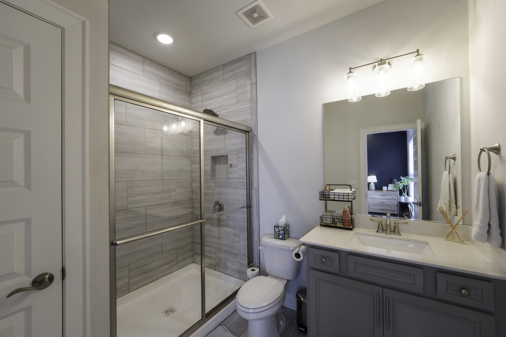 806 Chalkstone Ln Mount Mount Juliet, TN 37122 - Photo 40 of 65 a bathroom with a shower sink mirror and toilet