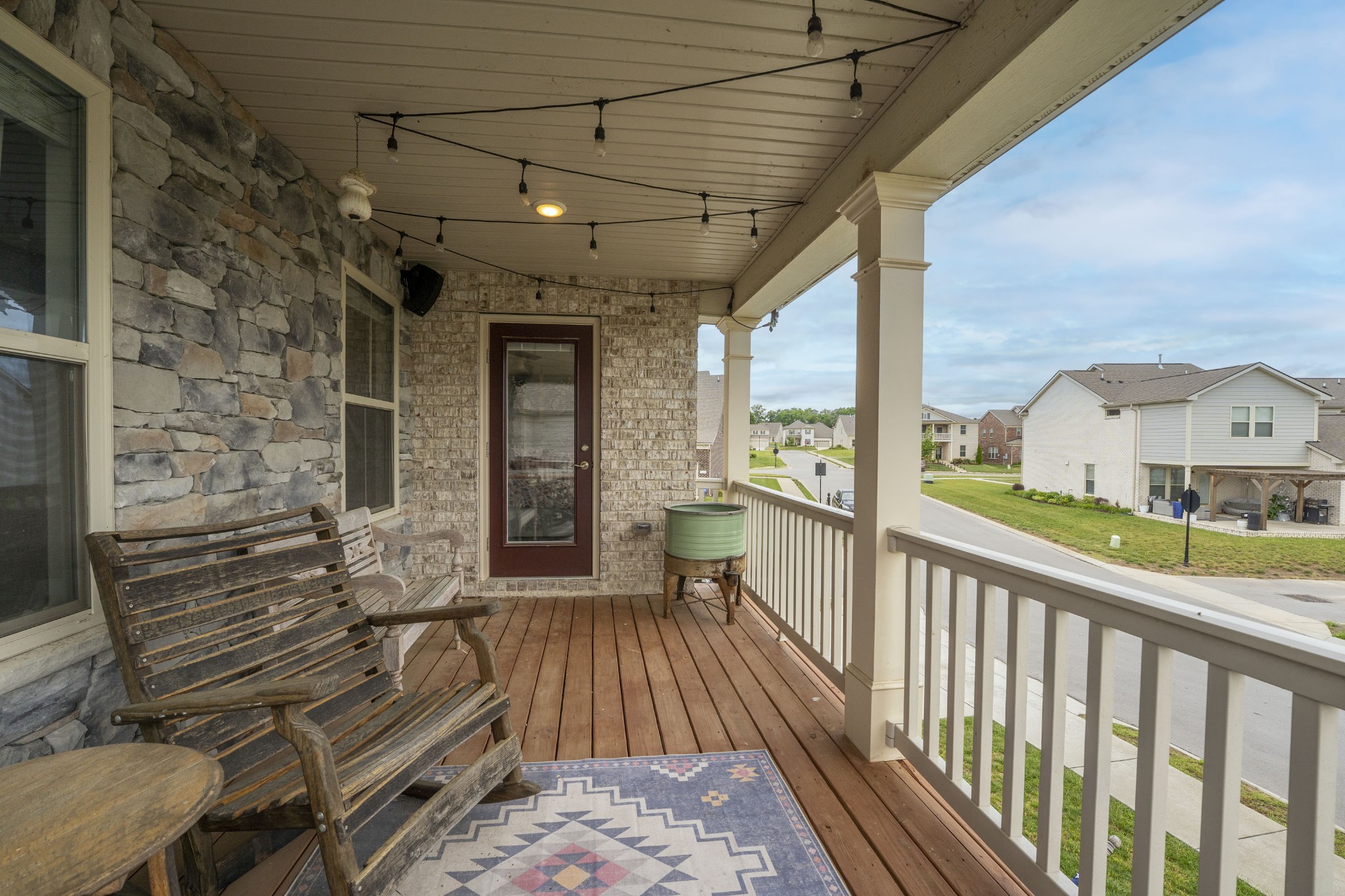806 Chalkstone Ln Mount Mount Juliet, TN 37122 - Photo 5 of 65 a view of a porch with wooden floor