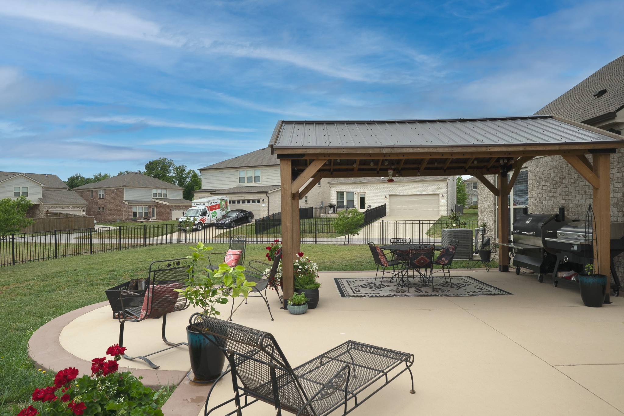 806 Chalkstone Ln Mount Mount Juliet, TN 37122 - Photo 55 of 65 a patio with table and chairs and potted plants