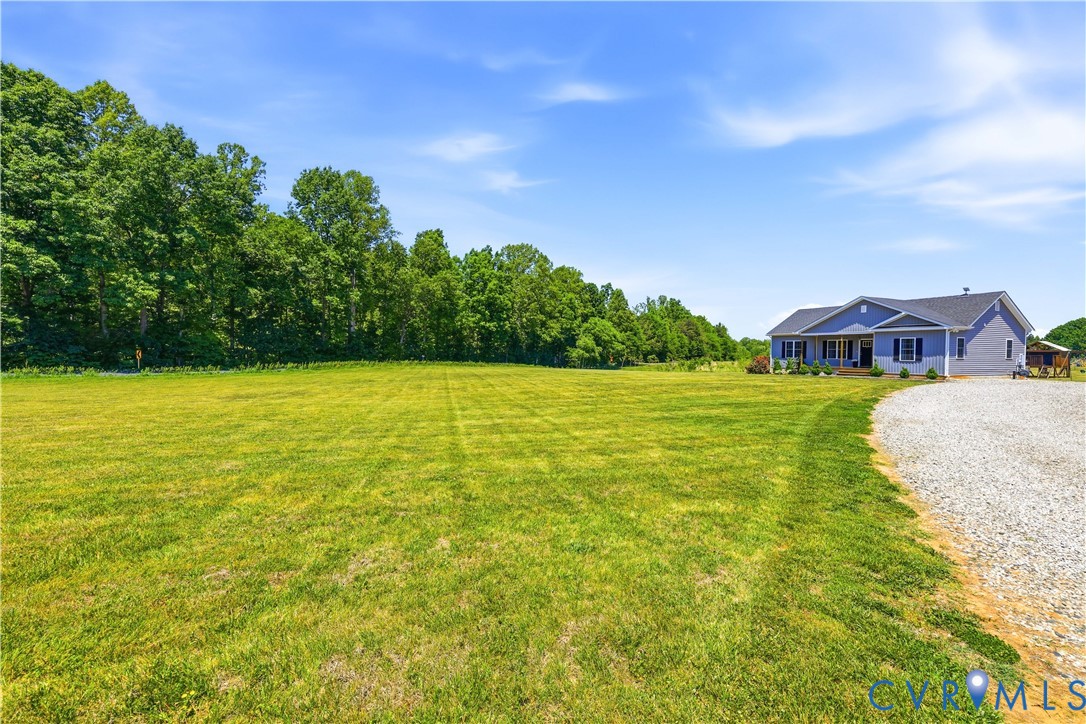 235 Stoney Point Road Cumberland, VA 23040 - Photo 5 of 35 a view of a lake with houses