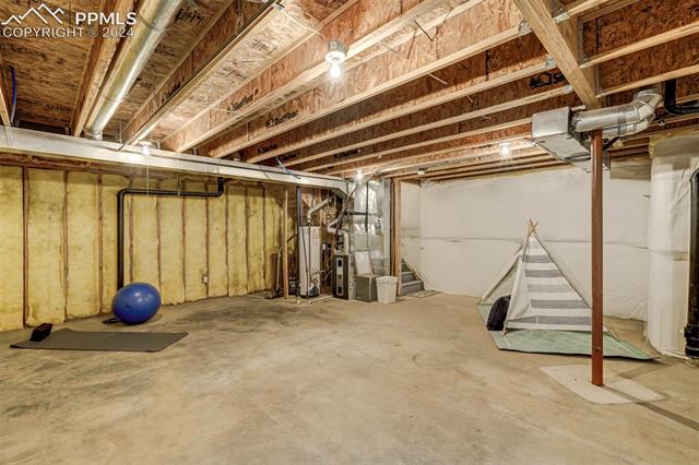 2002 Legacy Ridge View, Unit 112 Colorado Springs, CO 80910 - Photo 27 of 37 Perhaps a home gym, kids play area or.....?