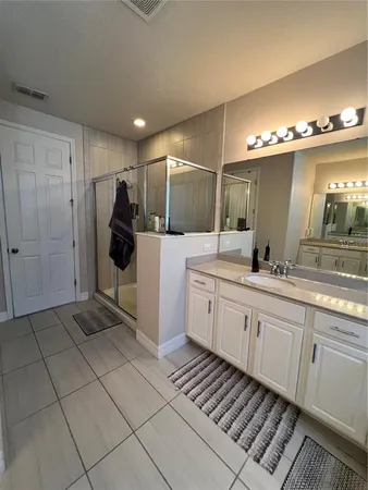 a kitchen with a stove and a refrigerator