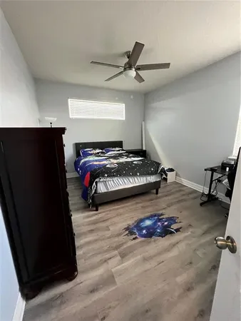 a living room with a couch and a rug