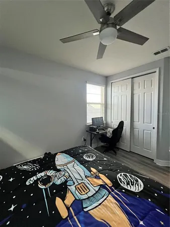 a view of a hall with a floor to ceiling window