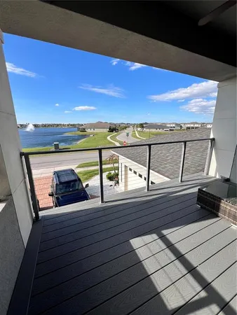 a view of a wooden floor with a bench