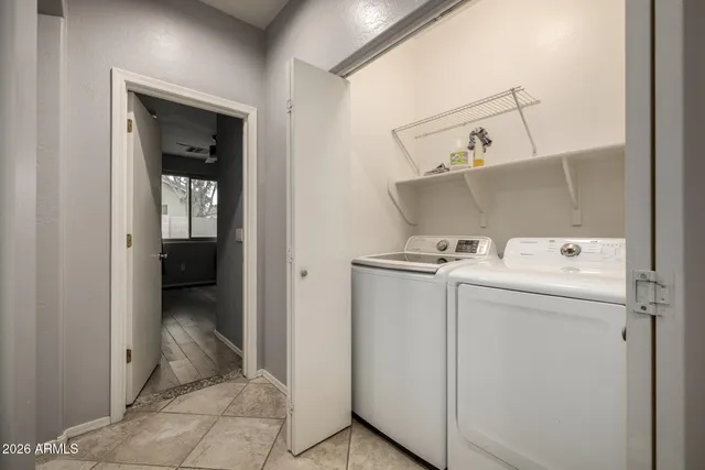 a utility room with dryer and washer