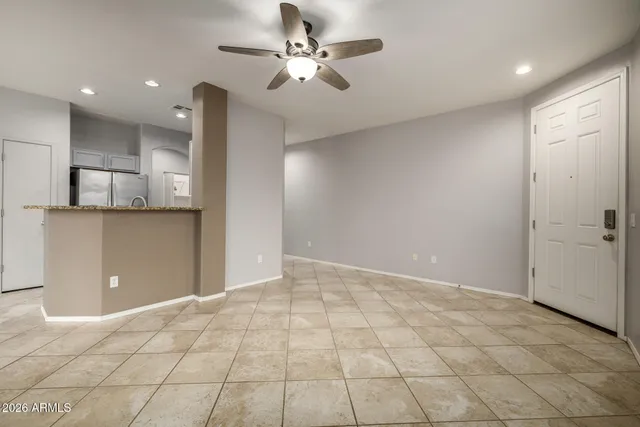 a view of a kitchen with a cabinet and a window
