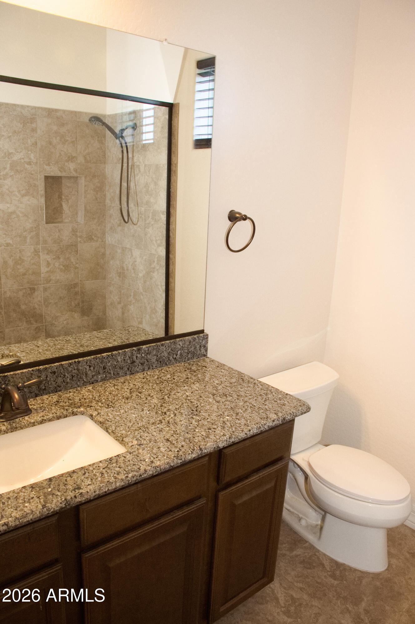 1623 East Hidalgo Street Apache Junction, AZ 85119 - Photo 21 of 65 a bathroom with a granite countertop sink toilet and shower