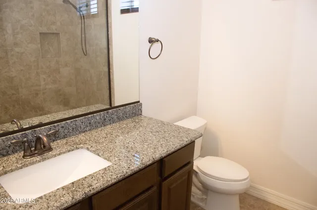 a view of a large building with large trees