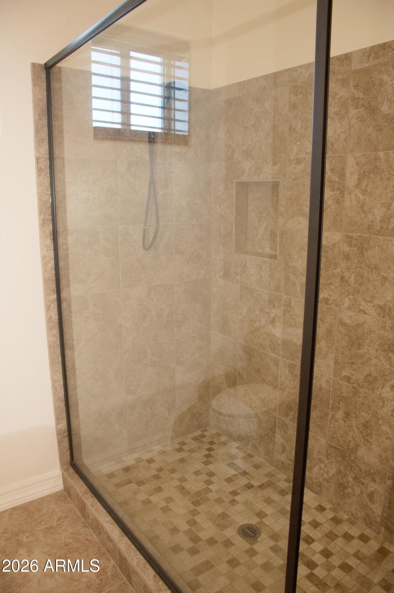 1623 East Hidalgo Street Apache Junction, AZ 85119 - Photo 27 of 65 a bathroom with a shower