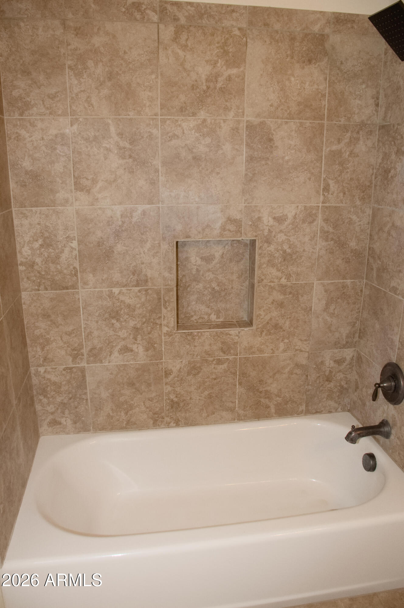 1623 East Hidalgo Street Apache Junction, AZ 85119 - Photo 51 of 65 a bathroom with a bathtub