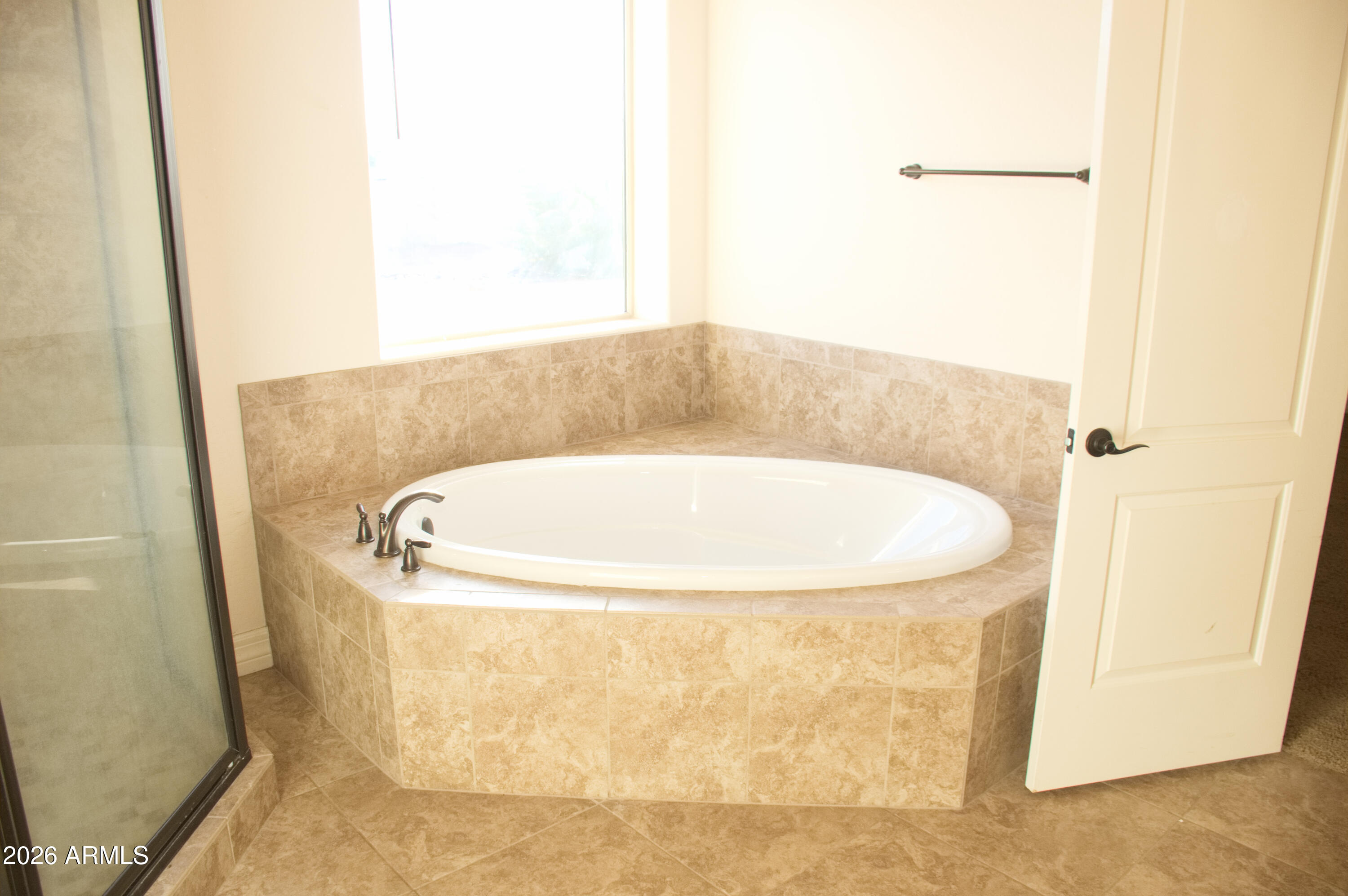 1623 East Hidalgo Street Apache Junction, AZ 85119 - Photo 61 of 65 a bathroom with a tub