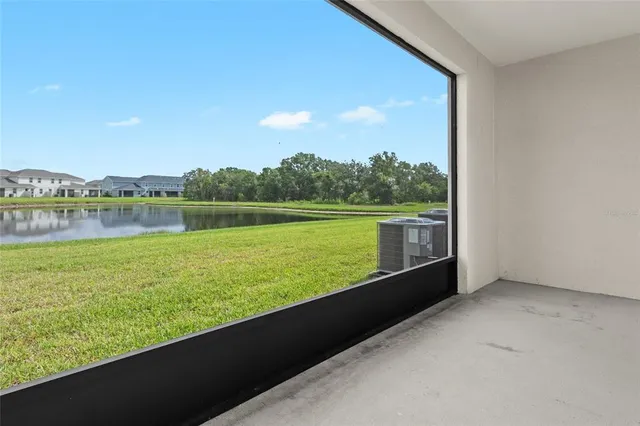 a view of a room with an empty shelves