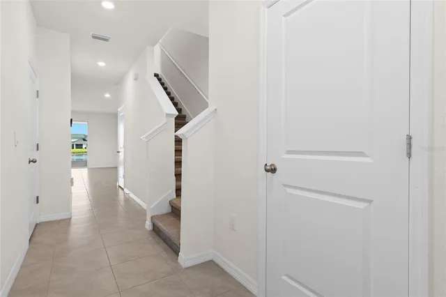 a view of entryway and workspace