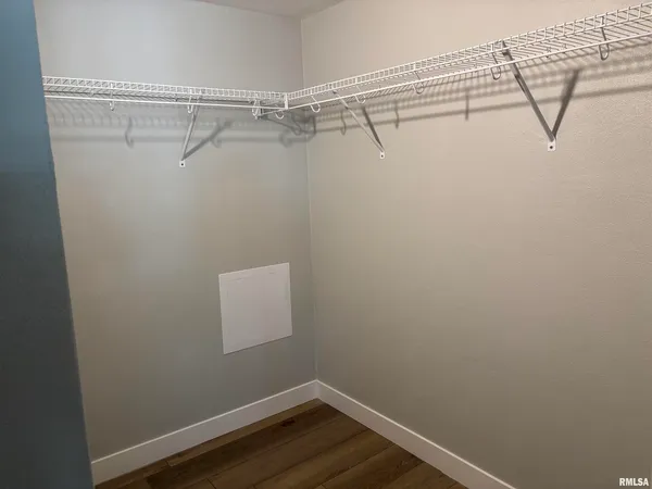 a view of a room with racks on the wall