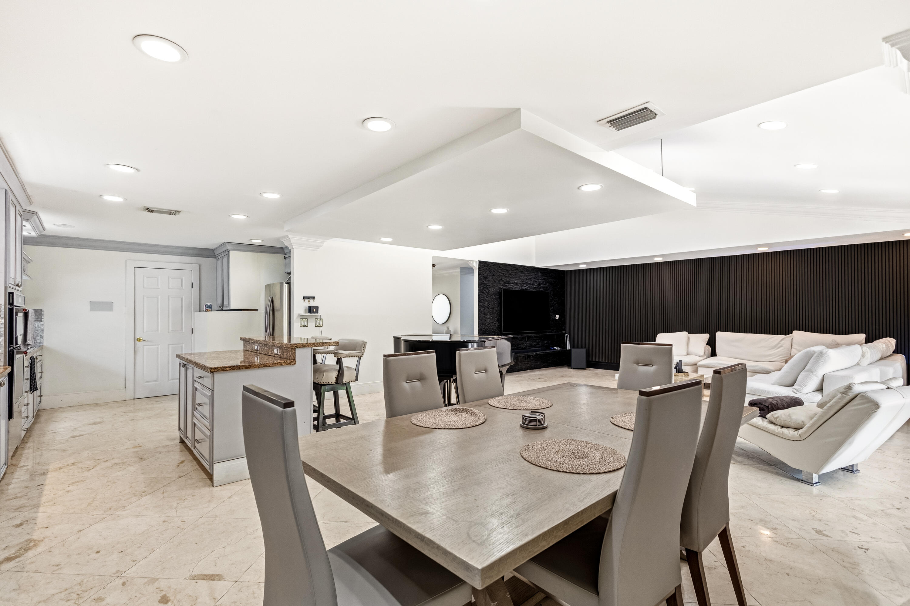 5223 Deerhurst Crescent Circle Boca Raton, FL 33486 - Photo 27 of 51 a view of a dining room with furniture