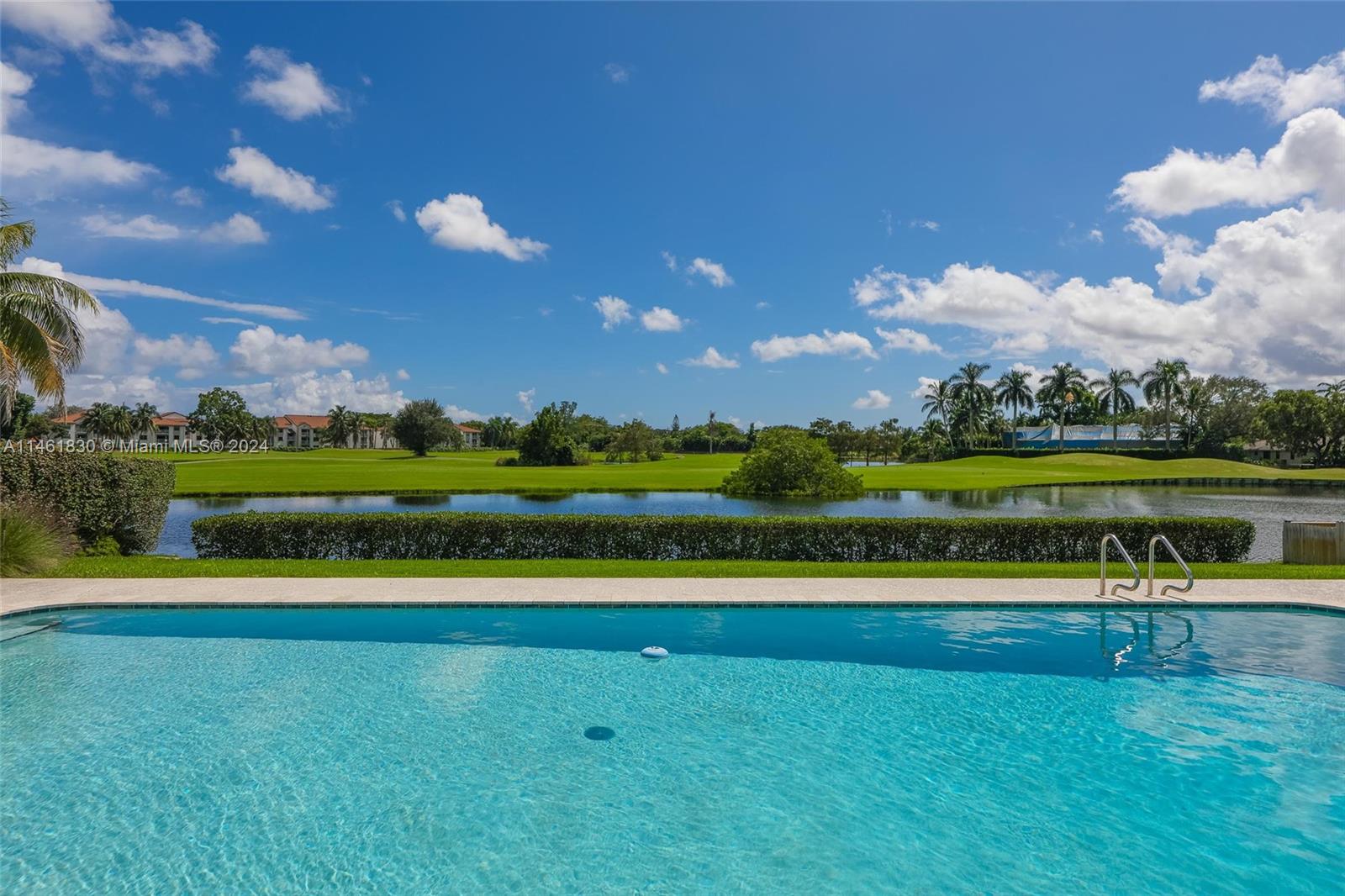 a view of a lake with a big yard