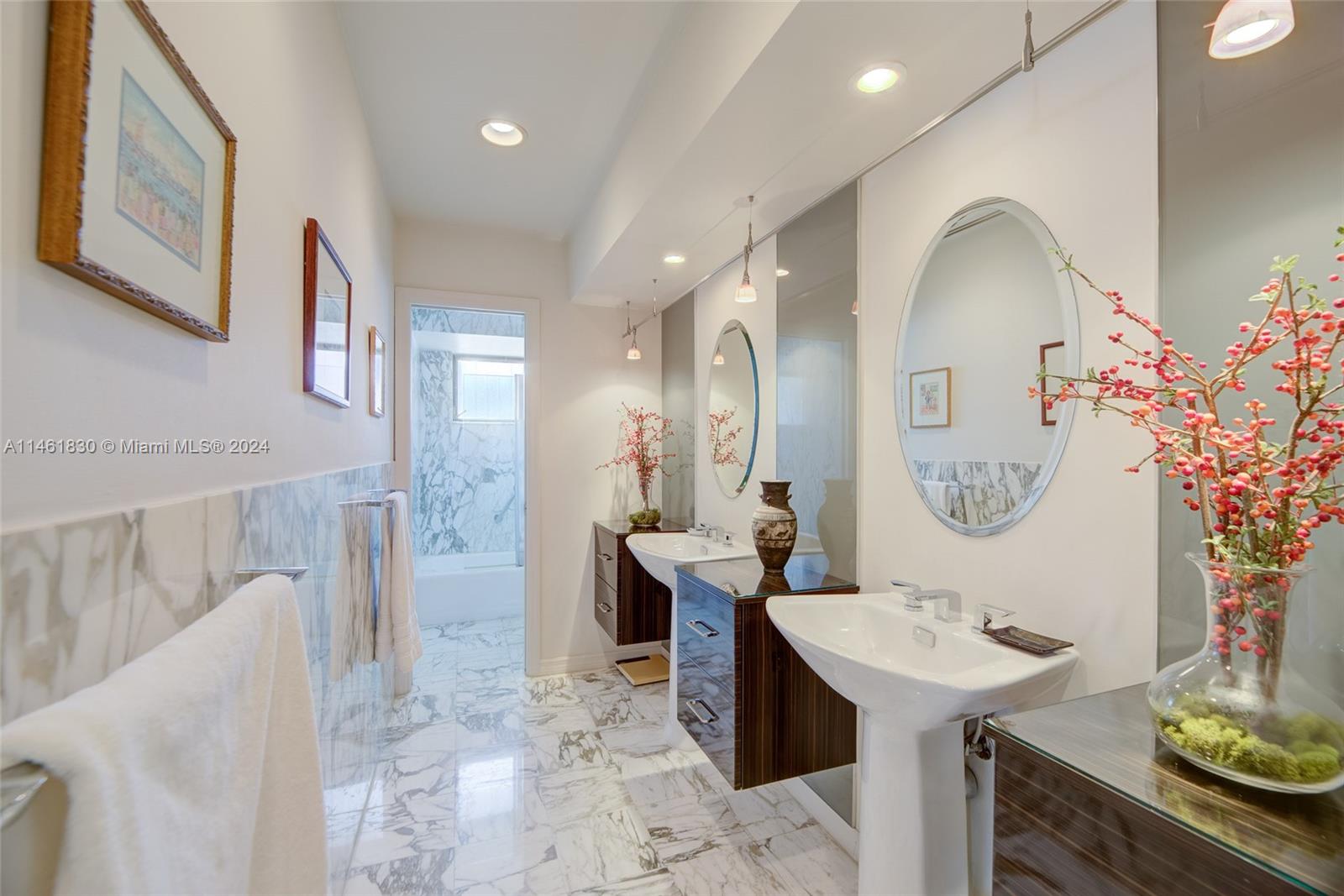 4300 Casper Court Hollywood, FL 33021 - Photo 16 of 24 a living room with furniture and paintings