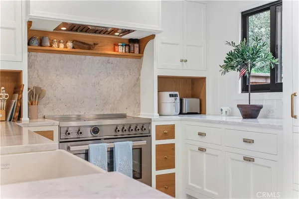 a view of a dining room with furniture and window