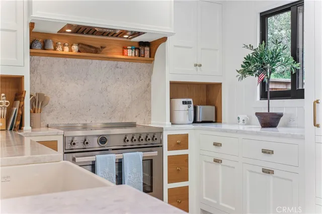 a view of a dining room with furniture and window