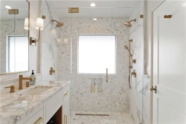 a bathroom with a shower curtain and a sink