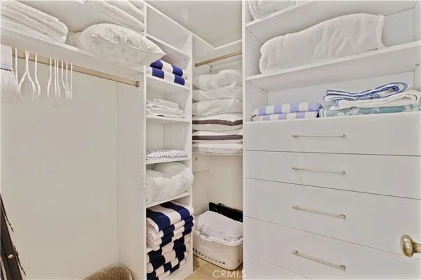 a close up view of a washer and dryer in a hallway
