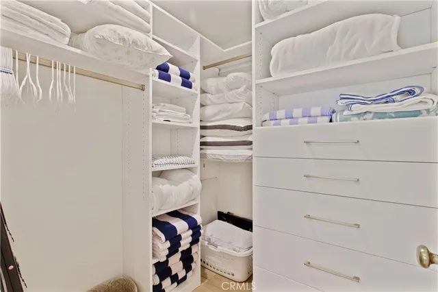 a close up view of a washer and dryer in a hallway